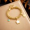 Moda europea y americana metal retro acero inoxidable chapado en oro flor luna estrella turquesa accesorios colgante cadena pulsera