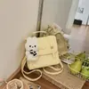 2026 Nova Bolsa Transversal de Ombro Único Elegante Simples Mochila Retro de Nicho Mochila de Mão Feminina Estudante