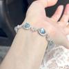 Pulsera abierta con diseño de serpiente y piedra Hao de estilo moderno para mujer, diseño de nicho de verano, pulsera con diseño de aguamarina.
