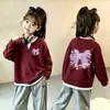 Top de punto gofre estilo coreano, imitación de dos piezas, manga larga para niñas, nuevo estilo primavera/otoño para niños medianos y grandes, versátil, elegante, capa base holgada