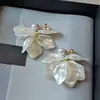 Pendientes Franceses Estilo Super Hada con Borlas Largas Pendientes de Pin de Plata Retro Lujo Ligero Altos Elegantes Pendientes de Pétalos de Lirio