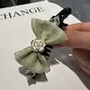 Primavera 2025 Nuevo Diseñador de Corea del Sur Pinza para el Cabello de Gasa con Lazo Pinza de Plátano de Camelia Disco para la Parte Posterior de la Cabeza Pinza para el Cabello