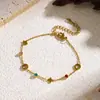 Cadena de Collar de Acero Inoxidable con Flor de Cuatro Hojas de Diamante de Colores al por Mayor Transfronterizo Europeo y Americano para Mujer, Diseño de Nicho con Diamantes Incrustados, Joyería de Lujo Ligero 18K