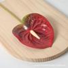 Sensação na mão 3D palma vermelha fogo palma de ganso flor de simulação plantio verde grande flocada arranjo de flores para banquete de casamento cena atacado