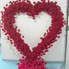 Fábrica de origem tecido simulado base vermelha arco em forma de coração parede de fundo rede de casamento rosa ponto de verificação flor simulada arte floral