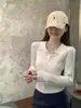 Suéter de punto de manga larga con cuello polo de color albaricoque estilo coreano para mujer, diseñado para primavera y otoño, corte ajustado, de longitud corta, top único y hermoso para principios de otoño