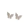 Estilo de Nicho Exquisito con un Toque de Lujo, Aretes Minimalistas y Frescos, Pequeños y Super Brillantes, Aretes de Mariposa Hueca de Perla Simples y de Moda