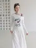 Conjunto de dos piezas de estilo coreano con estampado, corte relajado y pliegues, camiseta de hombros descubiertos para mujer, top versátil casual de manga larga, otoño 2026
