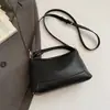 Bolso de mano de alta costura estilo coreano, bolso de hombro, nuevo modelo primavera 2026, bolso tipo almohada casual simple, bolso cruzado de nicho para mujer