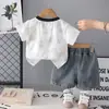Ropa Infantil Niños Conjunto de Verano 2026 Nueva Ropa de Verano para Bebé Guapo Letra Manga Corta Ropa de Verano para Niño Moderna