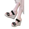 Pantuflas de mujer talla grande 2024 verano nuevo estilo bohemio europeo y americano con flores cuña punta abierta zapatos de mujer