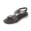 Sandálias Bohemian Style com Strass para Verão 2026 para Mulheres Bico Redondo Sandálias Casuais Sapatos Planos de Praia para Mulheres
