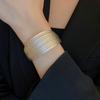 Brazalete Abierto Geométrico Multilínea Multicapa Metálico Nicho Electrochapado Personalidad Exagerada Brazalete de Alta Gama para Mujer