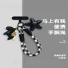 Original Lindo Yuanbao Caballo Correa de Teléfono Muñequera Anti-Pérdida Cuerda de Mano para Muñeca Funda de Teléfono Femenina Almohadilla Colgante de Nicho