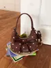 Diseño de nicho transfronterizo, bolso de mano pequeño retro, bolso cruzado para mujer, nueva tendencia de moda 2026, bolso de hombro casual para mujer