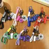 Llavero de Fitness Deportes Llavero Exquisito Colgante para Bolso Colgante para Mochila de Hombres y Mujeres Estilo Ins Colgante de Mancuerna de Fitness