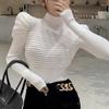 Camiseta de punto de manga abullonada de cuello alto medio para mujer, diseño de nicho para otoño e invierno, suéter elástico de alta calidad para adelgazar, top de moda