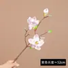 Ramo de flores artificiales de magnolia con tacto EVA, utilizado para decoración de escenas, creando una estética de alta gama y como arreglo floral con flores de magnolia.