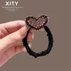 Goma para el pelo con diamantes de imitación en forma de corazón 2026 Nueva Cuerda para el pelo de alta gama Banda para el pelo de alta elasticidad Anillo elegante para el pelo Scrunchie de satén