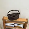 Nuevo Bolso de Mano Ligero Estilo Almohada para Mujer Versátil Diseño Tejido Nicho Moda 2026 Bolso de Hombro Cruzado para Verano