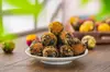 Té aromático de bola de dragón Pu'er hecho a mano de Yunnan transfronterizo té de bola de dragón de jazmín venta al por mayor té aromático de bola de dragón flor de rosa y peonía