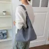 Bolso de ante retro para debajo del brazo para mujer, nuevo estilo coreano 2026, bolso tote simple con remaches, bolso cubo de gran capacidad