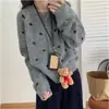 Nuevo suéter de punto casual holgado estilo perezoso para otoño e invierno con lunares, cuello redondo, botones, abrigo suéter para mujer
