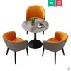 Mesa redonda de pizarra estilo nórdico para oficinas de ventas, tiendas de té de burbujas y balcones; un conjunto de mesas redondas y sillas de pizarra de lujo ligero