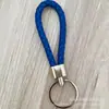 Llavero de cuerda de cuero trenzado simple creativo colgante de muñeca linda accesorios de llave para parejas tendencia regalos pequeños venta al por mayor