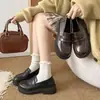 Zapatos de cuero estilo uniforme JK británico para mujer, nuevos populares de otoño 2026, mocasines de suela gruesa, zapatos slip-on versátiles