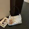 Otoño/Invierno 2026 Nuevo Bolso de Felpa de Lunares Bolso de Cadena Fufu Lechoso Bolso de Hombro Único Bolso de Axila Bolso Cruzado Moda Retro