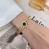 Pulseira de Aço Titânio com Trevo de Quatro Folhas em Toda a Peça para Meninas, Corda Vermelha, Joia de Mão Leve e Exquisita, de Luxo, Não Desbota, Venda Quente Transfronteiriça