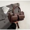 Bolso de diseño retro de nicho de alta gama para mujer, nuevo estilo 2025, bolso de hombro informal, bolso cruzado portátil a la moda y combinable.