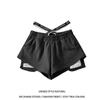 Shorts Calientes de Estilo Americano para Chica Frita de Calle de Cintura Baja para Mujer Verano 2025 Diseño Entrelazado Etiqueta Pierna Ancha Casual Pantalones Cortos Calientes de Tres Puntos a la Moda