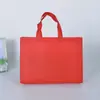 Bolso de mano impermeable no tejido en stock, con película de impresión a color para educación y formación, logotipo, protección del medio ambiente, bolso de compras de gran capacidad.