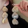 Aretes de borla de flor hueca de circón súper hada temperamento aguja de plata aretes comodín aretes de ambiente exagerado europeo y americano al por mayor