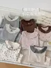 Conjunto de Pijama Infantil con Estampado Completo de Conejo Panadero Otoño 2026, Nuevo Top y Pantalones de Lana Elástica de Cuello Redondo para el Hogar Otoño-Invierno