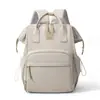 Nueva mochila de moda transfronteriza para mamás con gran capacidad, resistente al agua, separación de húmedo y seco, almacenamiento simple para madres y bebés