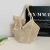 Bolsa de palha trançada para mulheres, grande capacidade, nova coleção primavera-verão 2025, bolsa de ombro versátil e casual com trama vazada para férias na praia