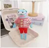 La ropa de los residentes de Fondo de Bikini incluye peces geniales, peces flácidos, peces acostados, colgantes, llaveros, accesorios, suéteres y overoles.