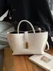Bolsa tote de gran capacidad transfronteriza para mujer, nuevo estilo 2026, retro, versátil, bolso de hombro para el trabajo, bolso de axila y bolso para mamá