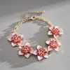 Pulsera de Metal con Parche de Flor de Goteo de Aceite Cruzada Europea y Americana, Pulsera Personalizada Dulce y Elegante, Joyería Simple y de Alta Gama para Mujeres