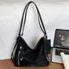 2026 Nova Bolsa Transversal Feminina Camurça Retrô Simples para o Dia a Dia Mochila Casual Simples Bolsa de Mão Bolsa de Ombro