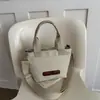 Bolso de hombro de gran capacidad para comercio exterior, nuevo bolso de mano versátil de moda primavera 2026, bolso cruzado casual simple para salir