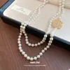 Collar de Perlas con Flor de Zirconia Hueca, Lujo Ligero y Sensación de Alta Gama, Cadena para Suéter de Nicho, Collar con Temperamento de Moda Retro al por Mayor