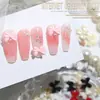 Ins Celebridad de Internet popular resina joyería para uñas al por mayor cinta de color lazo diy corbata de lazo tridimensional accesorios para uñas