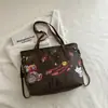 Bolsa Nueva de Dibujos Animados Simple y Elegante con una Textura Única, Bolso Tote de Verano 2026 para Mujer, Bolso de Hombro Retro Casual a la Moda