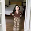 Tops y Camisetas Súper Elegantes y Atractivos para Niñas Sin Etiquetas en el Cuello, Pantalones de Campana Rayados Elásticos, Nueva Colección Otoño 2026