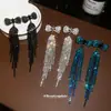 Aretes de Aguja Plateada con Borlas de Moño Incrustadas de Diamantes, Estilo Transfronterizo Europeo y Americano, Aretes de Diseño Único y Exagerado, Accesorios para Orejas de Nicho