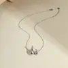 Collar Fino de Acero Inoxidable Transfronterizo con Elementos de Estrella, Luna, Corazón, Flor y Ala, Cadena para Clavícula Versátil de Múltiples Capas al por Mayor